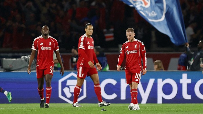 Soccer Football - UEFA Champions League - Quarter Final - First Leg - Paris St Germain v Liverpool - Parc des Princes, Paris, France - April 8, 2026 Liverpools Ibrahima Konate, Virgil van Dijk and Alexis Mac Allister look dejected after Paris St Ger