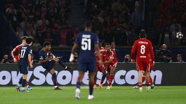 Soccer Football - UEFA Champions League - Quarter Final - First Leg - Paris St Germain v Liverpool - Parc des Princes, Paris, France - April 8, 2026 Paris St Germain's Desire Doue scores their first goal Action Images via Reuters/Lee Smith