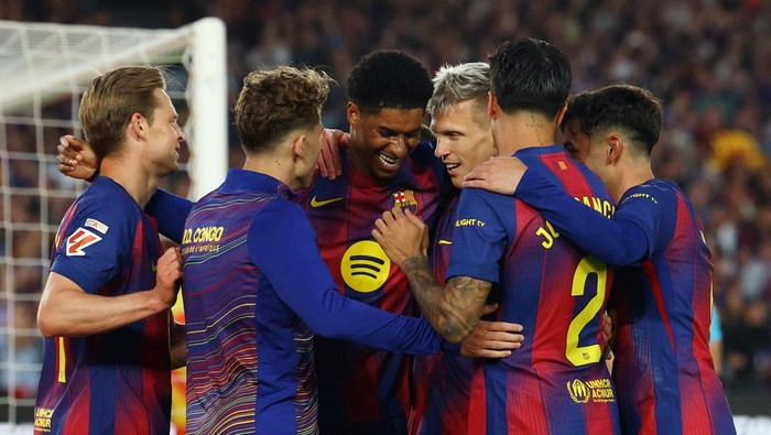 Soccer Football - LaLiga - FC Barcelona v Espanyol - Spotify Camp Nou, Barcelona, Spain - April 11, 2026 FC Barcelonas Marcus Rashford celebrates scoring their fourth goal with teammates REUTERS/Albert Gea