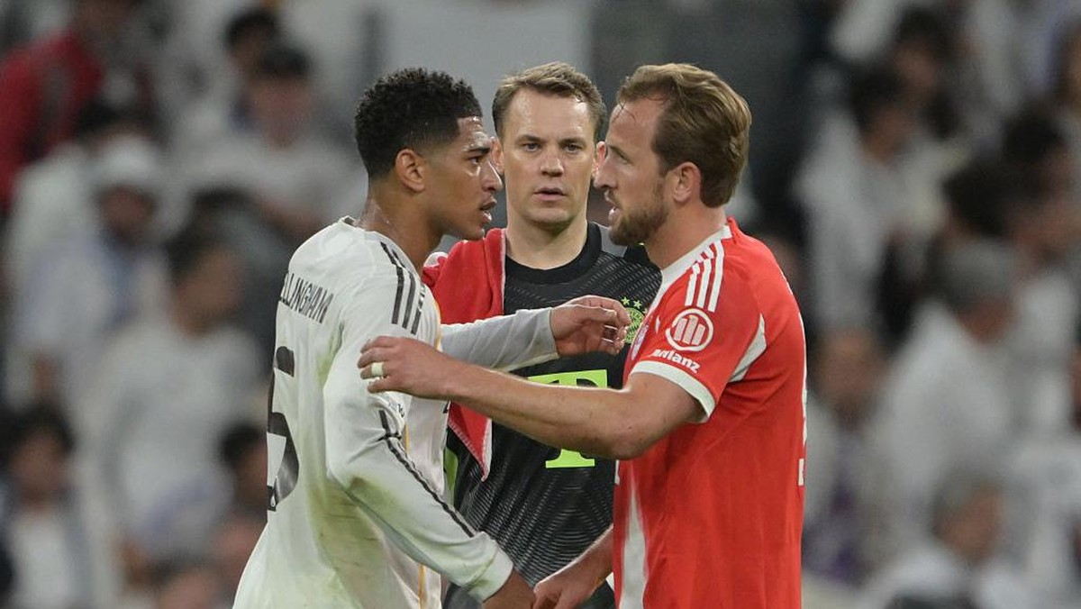 Jude Bellingham (kiri) dan Harry Kane usai laga Real Madrid vs Bayern Munich pekan lalu. Foto: dpa/picture alliance via Getty I/picture alliance