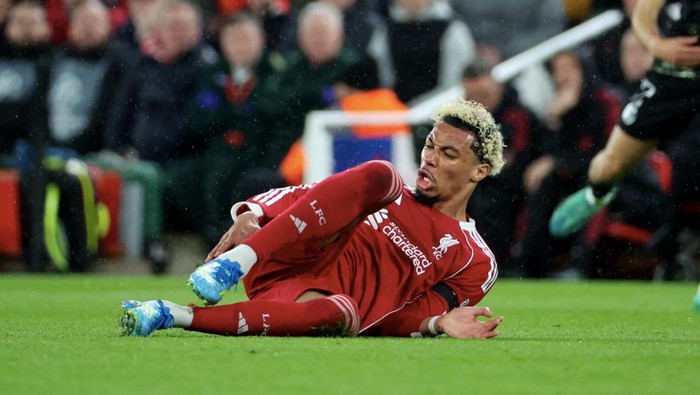 LIVERPOOL, ENGLAND - APRIL 14: Hugo Ekitiké #22 of Liverpool FC reacts after his injury during the UEFA Champions League 2025/26 Quarter-Final Second Leg match between Liverpool FC and Paris Saint-Germain at Anfield on April 14, 2026 in Liverpool, E