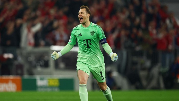 Soccer Football - UEFA Champions League - Quarter Final - Second Leg - Bayern Munich v Real Madrid - Allianz Arena, Munich, Germany - April 15, 2026 Bayern Munichs Manuel Neuer celebrates after Aleksandar Pavlovic scores their first goal REUTERS/Kai