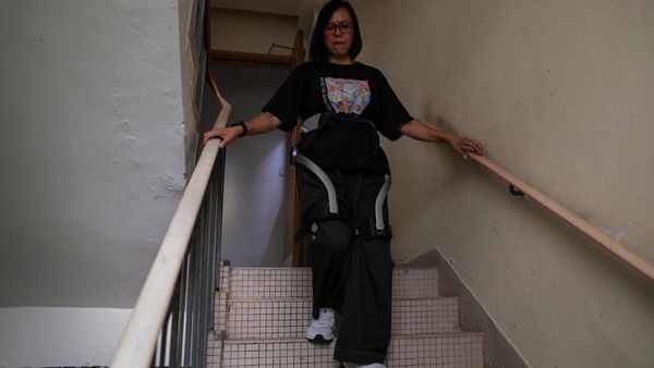 Kaki Robot Bantu Korban Kebakaran Apartemen Hong Kong