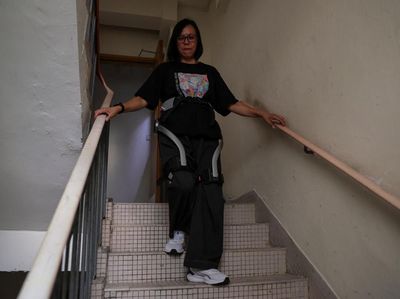 Kaki Robot Bantu Korban Kebakaran Apartemen Hong Kong