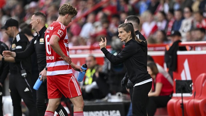 BERLIN, GERMANY - APRIL 18: Marie-Louise Eta, is the first female head coach of Union Berlin in the Bundesliga history, is seen during the match between Union Berlin and VfL Wolfsburg at the An der Alten Forsterei Stadium in Berlin, Germany on April 