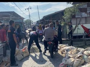 Panipahan Berbenah, Polisi dan Warga Kompak Perbaiki Jalan dan Bersih-bersih