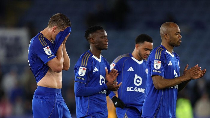 LEICESTER, ENGLAND - APRIL 21: Jannik Vestergaard, Patson Daka and Jordan Ayew of Leicester City look dejected as Leicester City are relegated to League One during the Sky Bet Championship match between Leicester City and Hull City at The King Power 