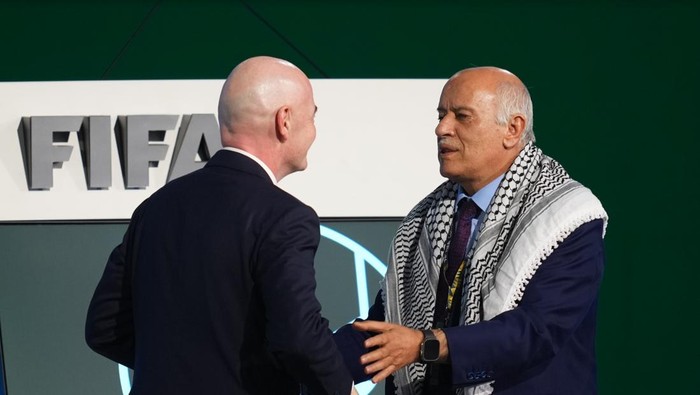 VANCOUVER, BRITISH COLUMBIA - APRIL 30: Gianni Infantino, President of FIFA, greets Jibril Rajoub, President of the Palestine Football association, during the 76th FIFA Congress on April 30, 2026 in Vancouver, British Columbia. (Photo by Rich Lam - F
