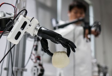 China Makin Maju Kembangkan Robot Musik hingga Tangan AI
