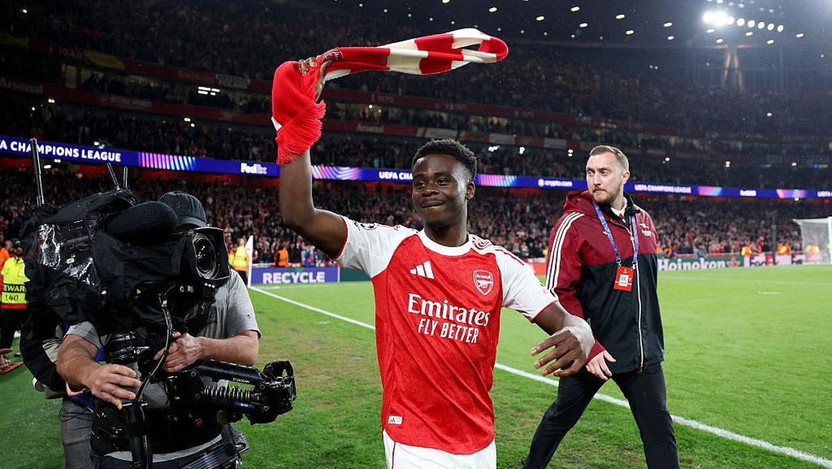 Saka merayakan kelolosan Arsenal ke final Liga Champions musim ini. Foto: UEFA via Getty Images/Michael Regan - UEFA