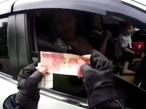 Salut! Polantas Ini Tolak Suap Pemobil Pakai Nopol Palsu di Puncak Bogor