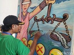 Aksi Kreatif Seniman Mural di MCC Malang Suarakan Keadilan