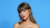Taylor Swift Bak Karakter Mainan di Premiere Toy Story 5, Manis Bergaun Putih