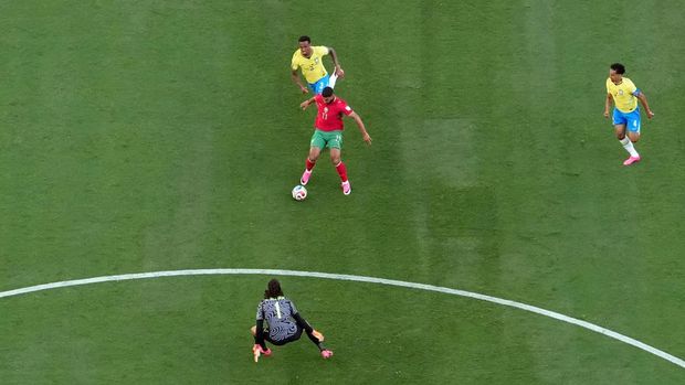Soccer Football - FIFA World Cup 2026 - Group C - Brazil v Morocco - New York/New Jersey Stadium, East Rutherford, New Jersey, U.S. - June 13, 2026 Morocco's Ismael Saibari scores their first goal past Brazil's Alisson Becker REUTERS/Dylan Martinez