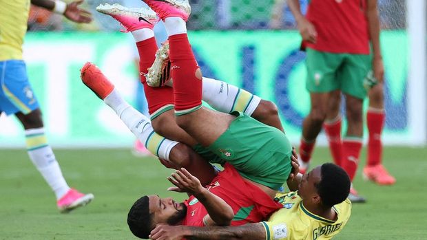 Soccer Football - FIFA World Cup 2026 - Group C - Brazil v Morocco - New York/New Jersey Stadium, East Rutherford, New Jersey, U.S. - June 13, 2026 Brazil's Gabriel Magalhaes in action with Morocco's Ismael Saibari REUTERS/John Sibley