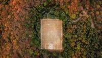 Lapangan Sepak Bola Dibangun di Kawah Gunung Berapi, Kok Bisa?