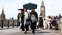 London Dihantam Cuaca Panas, Warga Beraktivitas di Tengah Terik Matahari