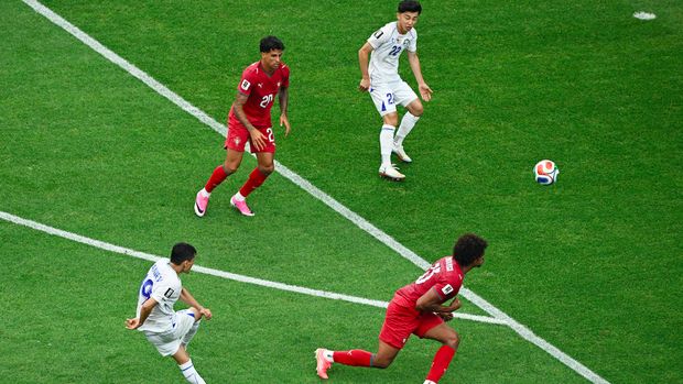 Soccer Football - FIFA World Cup 2026 - Group K - Portugal v Uzbekistan - Houston Stadium, Houston, Texas, U.S. - June 23, 2026 Uzbekistan's Azizjon Ganiev scores a goal that was later disallowed REUTERS/Annegret Hilse