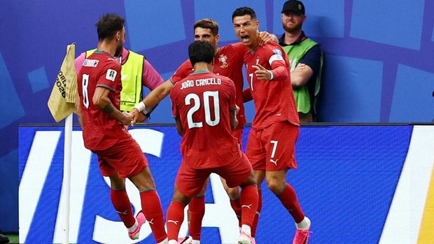 Soccer Football - FIFA World Cup 2026 - Group K - Portugal v Uzbekistan - Houston Stadium, Houston, Texas, U.S. - June 23, 2026 Portugal's Cristiano Ronaldo celebrates scoring their third goal with Joao Cancelo, Bruno Fernandes and Pedro Neto REUTERS/Phil Noble