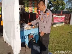 Kapolsek Winongan Borong Cilok untuk Sopir Truk Antre Solar di Pasuruan