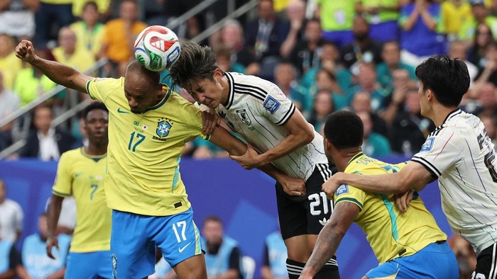 Soccer Football - FIFA World Cup 2026 - Round of 32 - Brazil v Japan - Houston Stadium, Houston, Texas, U.S. - June 29, 2026 Brazils Fabinho in action with Japans Hiroki Ito IMAGN IMAGES via Reuters/Troy Taormina