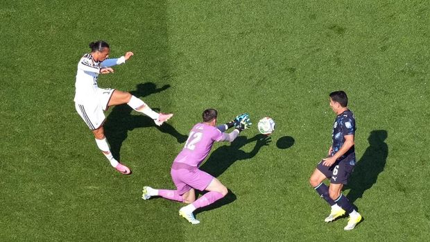 Soccer Football - FIFA World Cup 2026 - Round of 32 - Germany v Paraguay - Boston Stadium, Foxborough, Massachusetts, U.S. - June 29, 2026 Paraguay's Orlando Gill and Junior Alonso in action with Germany's Leroy Sane REUTERS/Brian Snyder