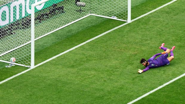 Soccer Football - FIFA World Cup 2026 - Round of 32 - Brazil v Japan - Houston Stadium, Houston, Texas, U.S. - June 29, 2026 Japan's Kaishu Sano scores their first goal past Brazil's Alisson Becker REUTERS/Pedro Nunes