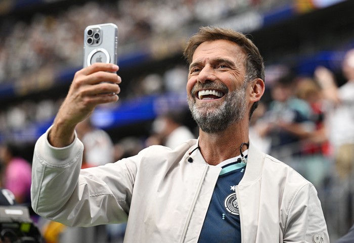Soccer Football - FIFA World Cup 2026 - Group E - Germany v Curacao - Houston Stadium, Houston, Texas, U.S. - June 14, 2026 Red Bulls Global Head of Soccer Juergen Klopp takes a photograph inside the stadium after the match REUTERS/Annegret Hilse