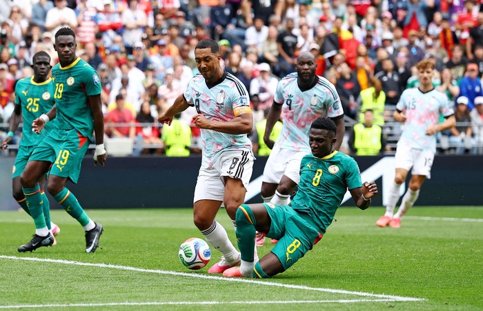 Soccer Football - FIFA World Cup 2026 - Round of 32 - Belgium v Senegal - Seattle Stadium, Seattle, Washington, U.S. - July 1, 2026 Senegals Lamine Camara tackles Belgiums Youri Tielemans in the penalty area before a VAR review REUTERS/Agustin Marc