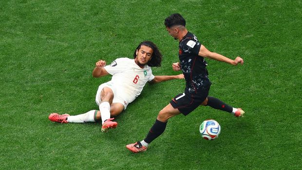 Soccer Football - FIFA World Cup 2026 - Round of 16 - Canada v Morocco - Houston Stadium, Houston, Texas, U.S. - July 4, 2026 Canada's Stephen Eustaquio in action with Morocco's Ayyoub Bouaddi REUTERS/Issei Kato
