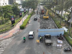 Pengembang JGC Mulai Perbaiki Jalan Rusak Secara Bertahap