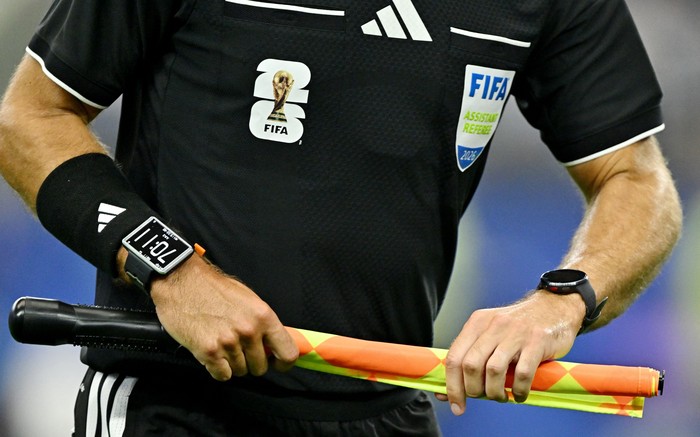 Soccer Football - FIFA World Cup 2026 - Round of 16 - Portugal v Spain - Dallas Stadium, Arlington, Texas, U.S. - July 6, 2026 General view of the FIFA signage on the shirt of the assistant referee IMAGN IMAGES via Reuters/Maria Lysaker