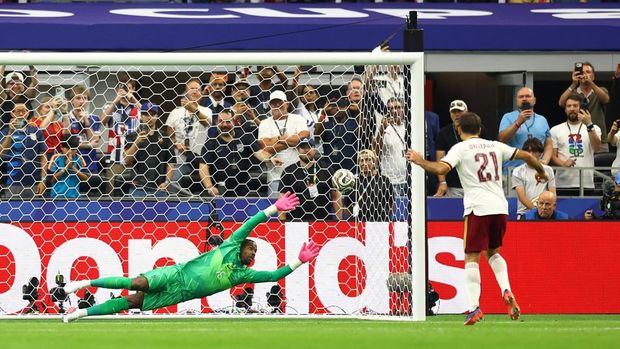 Soccer Football - FIFA World Cup 2026 - Semi Final - France v Spain - Dallas Stadium, Arlington, Texas, U.S. - July 14, 2026 Spain's Mikel Oyarzabal scores their first goal from the penalty spot REUTERS/Hannah Mckay