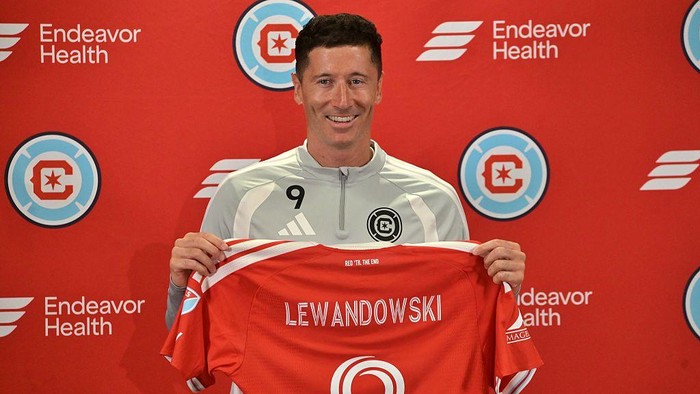 CHICAGO, ILLINOIS - JULY 14: Robert Lewandowski (9) poses with a jersey after being introduced by the Chicago Fire FC at a press conference at Endeavor Health Performance Center in Chicago, Illinois on July 14, 2026. (Photo by Jacek Boczarski/Anadolu