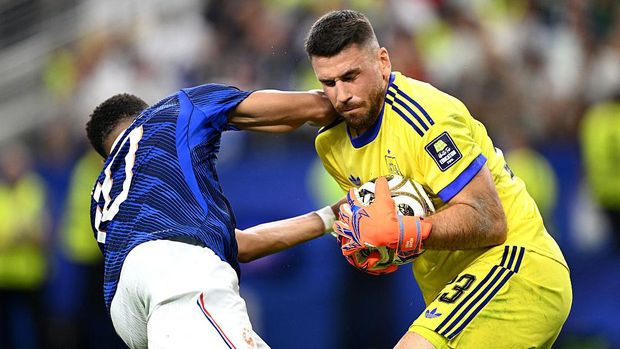 ARLINGTON, TEXAS - JULY 14: Unai Simon #23 of Spain makes a save against Kylian Mbappe #10 of France during the FIFA World Cup 2026 Semi Final match between France and Spain at Dallas Stadium on July 14, 2026 in Arlington, Texas. Mbappe was shown a yellow card on the play. (Photo by Hannah Peters - FIFA/FIFA via Getty Images)