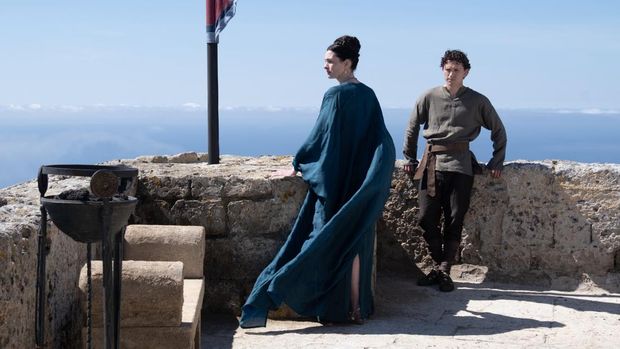 Film The Odyssey (2026) L to R: Anne Hathaway is Penelope and Tom Holland is Telemachus in THE ODYSSEY, written, produced, and directed by Christopher Nolan.