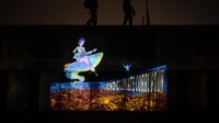 Warga Terpukau, Festival Dadap Vol. 5 Hadirkan Pesona Video Mapping di Tanggul Laut