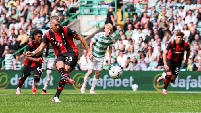 GLASGOW, SCOTLAND - JULY 25: Francesco Camarda of AC Milan scores from the penalty spot to make it Celtic 2-1 AC Milan during the Celtic v AC Milan match in a pre-season friendly at Celtic Park on July 25, 2026 in Glasgow, Scotland. (Photo by WM Spor