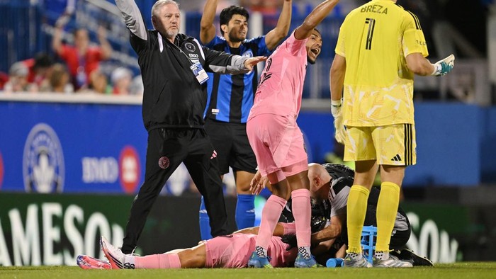 MONTREAL, QUEBEC - JULY 25: Yannick Bright #42 of Inter Miami CF calls for medical treatment for German Berterame #19 during the MLS match between CF Montreal and Inter Miami CF at Saputo Stadium on July 25, 2026 in Montreal, Quebec. (Photo by Minas 