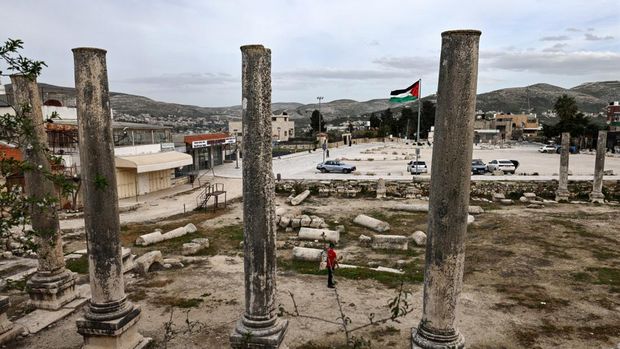 (FILES) This picture taken on February 12, 2026 shows a view of the archaeological site of Sebastia, west of the Israeli-occupied West Bank city of Nablus. The UN's cultural agency on July 24, 2026, placed locations including a Lebanese castle recently conquered by Israeli forces and an archaeological site in the occupied West Bank on its list of World Heritage in Danger. Sebastia is thought to be the ancient Israeli and later Roman city of Samaria, whose name Israel still uses to refer to the northern West Bank. In recent years, Israeli authorities have taken an interest in the site, which sits near the modern Palestinian town of Sebastia but is in an area controlled exclusively by Israel. In 2025, they expropriated around 200 hectares of Palestinian land near the site, saying it was for preservation and development purposes. (Photo by Zain JAAFAR / AFP)
