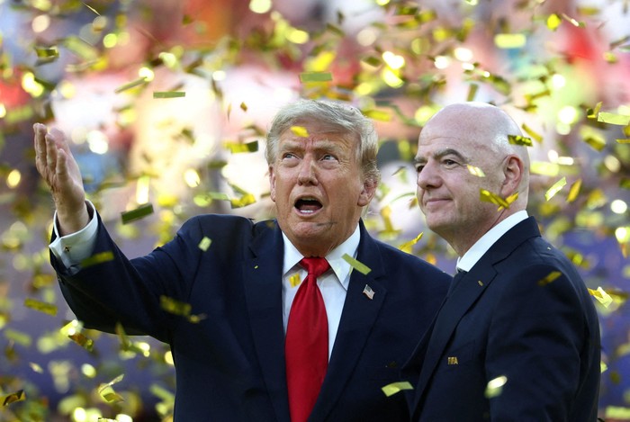 Soccer Football - FIFA World Cup 2026 - Final - Spain v Argentina - New York/New Jersey Stadium, East Rutherford, New Jersey, U.S. - July 19, 2026 U.S. President Donald Trump and FIFA President Gianni Infantino during the trophy presentation after th