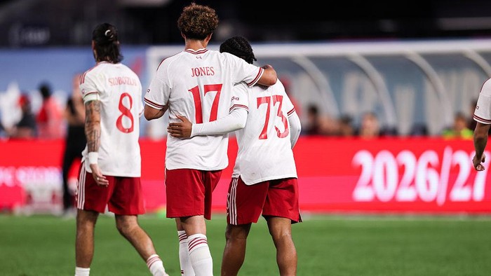 NEW YORK, NEW YORK - JULY 29: Rio Ngumoha #73 of Liverpool FC celebrates with teammate Curtis Jones #17 after scoring the teams first goal during the second half of the pre-season friendly against Wrexham AFC at Yankee Stadium on July 29, 2026 in Ne