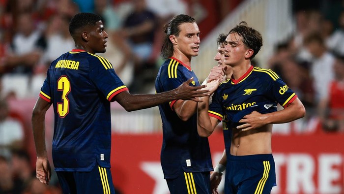 GIRONA, SPAIN - AUGUST 01: Max Dowman of Arsenal celebrates  with his teammates after scoring the teams third goal during the during the pre-season friendly match between Girona FC and Arsenal FC at Montilivi Stadium on August 01, 2026 in Girona, Sp