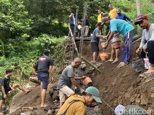 Dana Desa Dipangkas Rp 558 Juta, Warga Klungkung Patungan Perbaiki Jalan Amblas