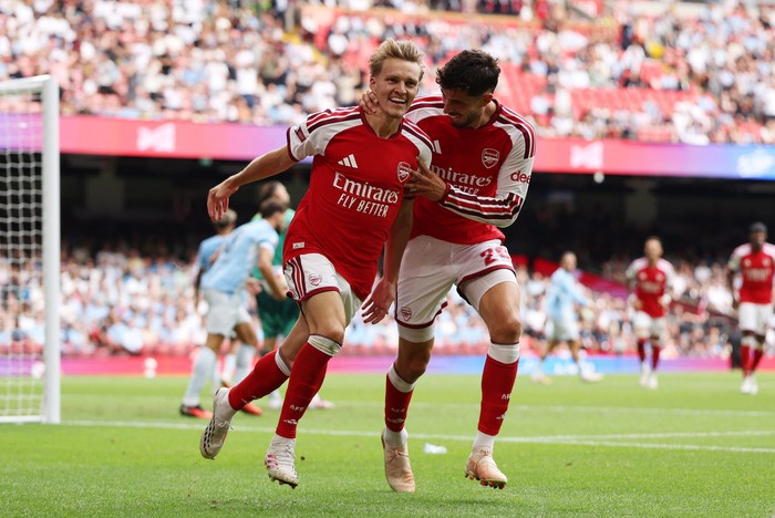 Soccer Football - FA Community Shield - Arsenal v Manchester City - Principality Stadium, Cardiff, Wales, Britain - August 16, 2026 Arsenal's Martin Odegaard celebrates scoring their third goal with Kai Havertz REUTERS/Chris Radburn