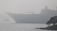 Kabut Tebal Selimuti Feri-feri yang Melintas di Sydney Harbour