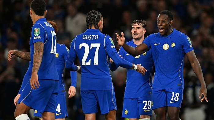 LONDON, ENGLAND - AUGUST 27: Danny Welbeck of Chelsea celebrates scoring his teams first goal with Malo Gusto during the Carabao Cup Second Round match between Chelsea and Luton Town at Stamford Bridge on August 27, 2026 in London, England. (Photo by