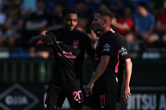 OSWESTRY, ENGLAND - JULY 14: Joy-Lance Mickels of Sabah FK celebrates scoring his sides first goal during the UEFA Champions League 2026/27 First Qualifying Round second leg match between The New Saints and Sabah at Park Hall on July 14, 2026 in Oswe
