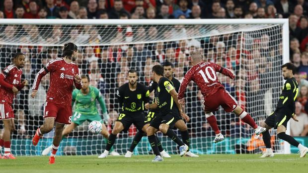 Liverpool vs Atletico Madrid Soccer Football - UEFA Champions League - Liverpool v Atletico Madrid - Anfield, Liverpool, Britain - September 9, 2026 Liverpool's Alexis Mac Allister scores their second goal Action Images via Reuters/Jason Cairnduff