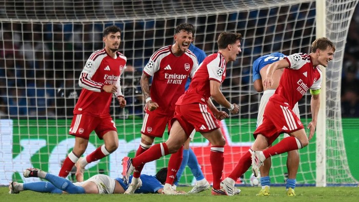 NAPLES, ITALY - SEPTEMBER 09: Martin Odegaard of Arsenal celebrates his goal during the UEFA Champions League 2026/27 League Phase MD1 match between SSC Napoli and Arsenal FC at Stadio Diego Armando Maradona on September 09, 2026 in Naples, Italy. (P
